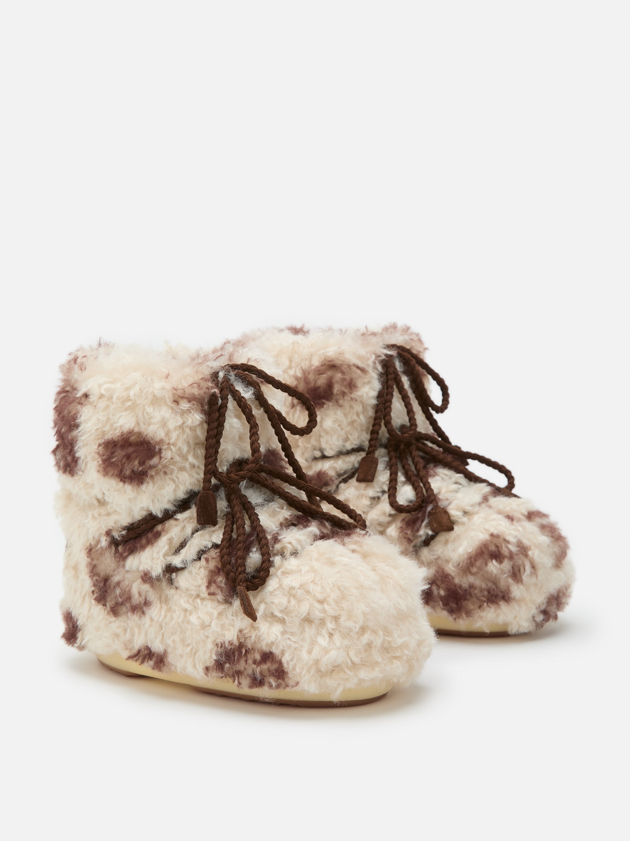 ICON LOW COW PRINT CURLY BOOTS